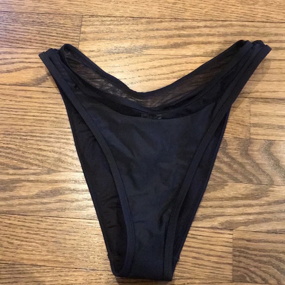 Black high cut bikini bottom with mesh rim